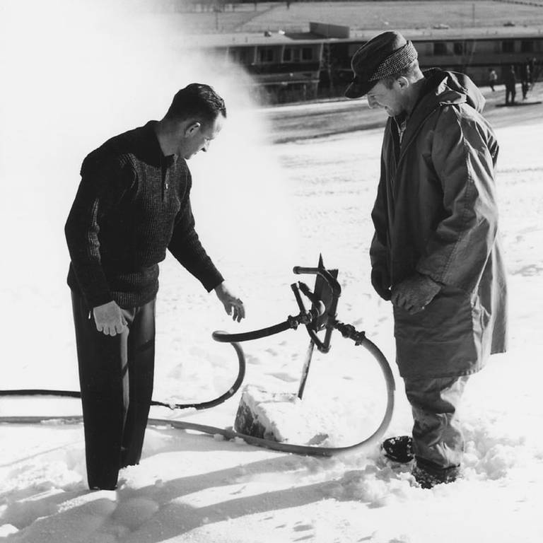 Everett Kircher testing an early 1950s snowmaker.