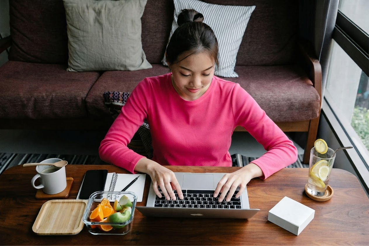 Image of a woman on a computer.