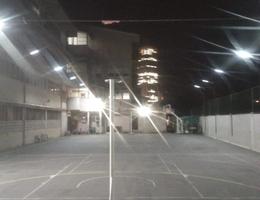 Night illuminated solar flood lights on the grounds