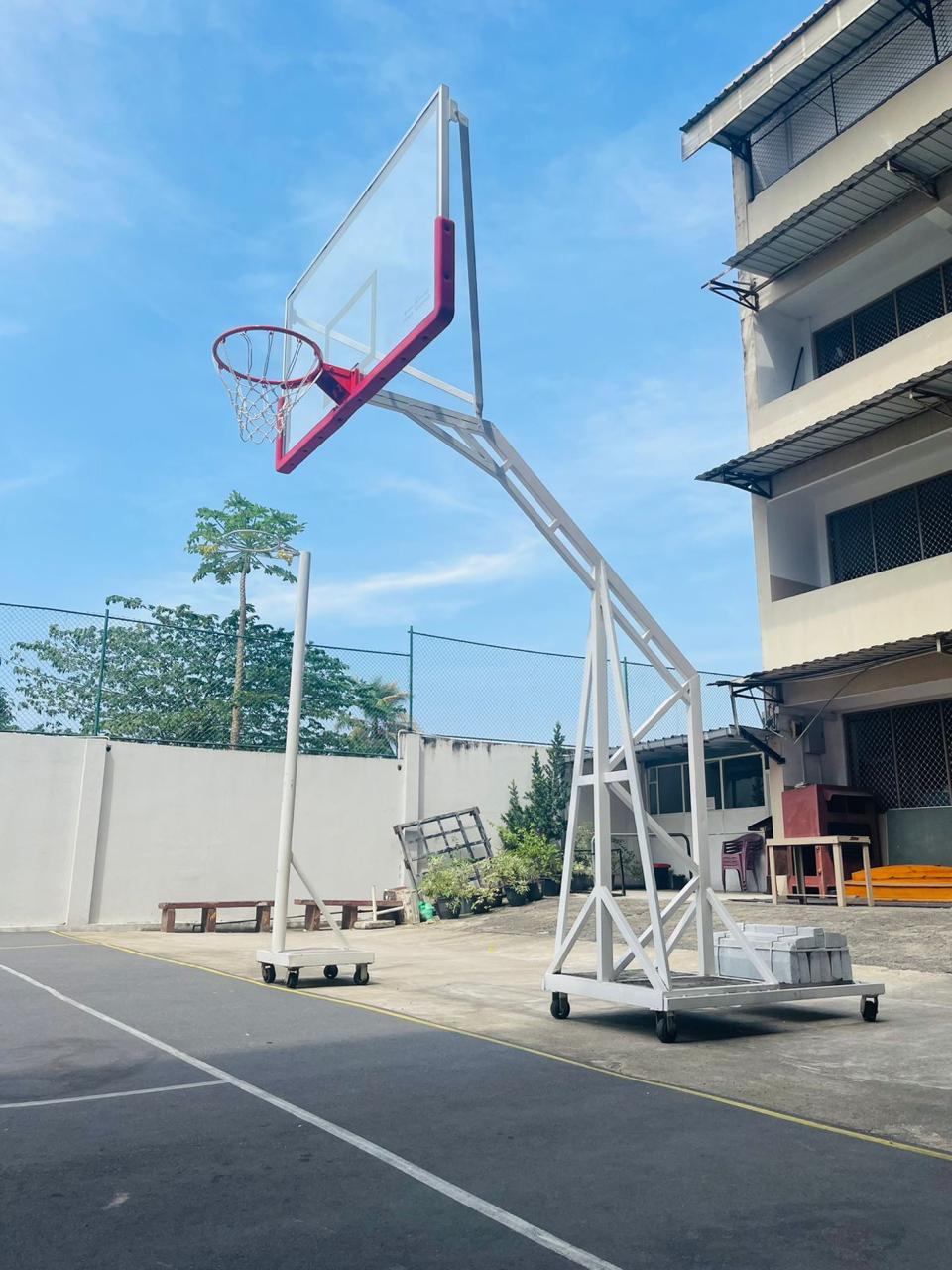 Basketball poles with acrylic backboard