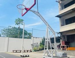 Basketball poles with acrylic backboard