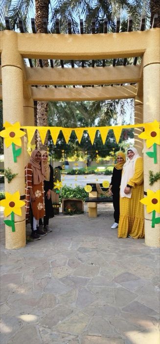 Dubai chapter members at a yellow-themed outdoor meetup
