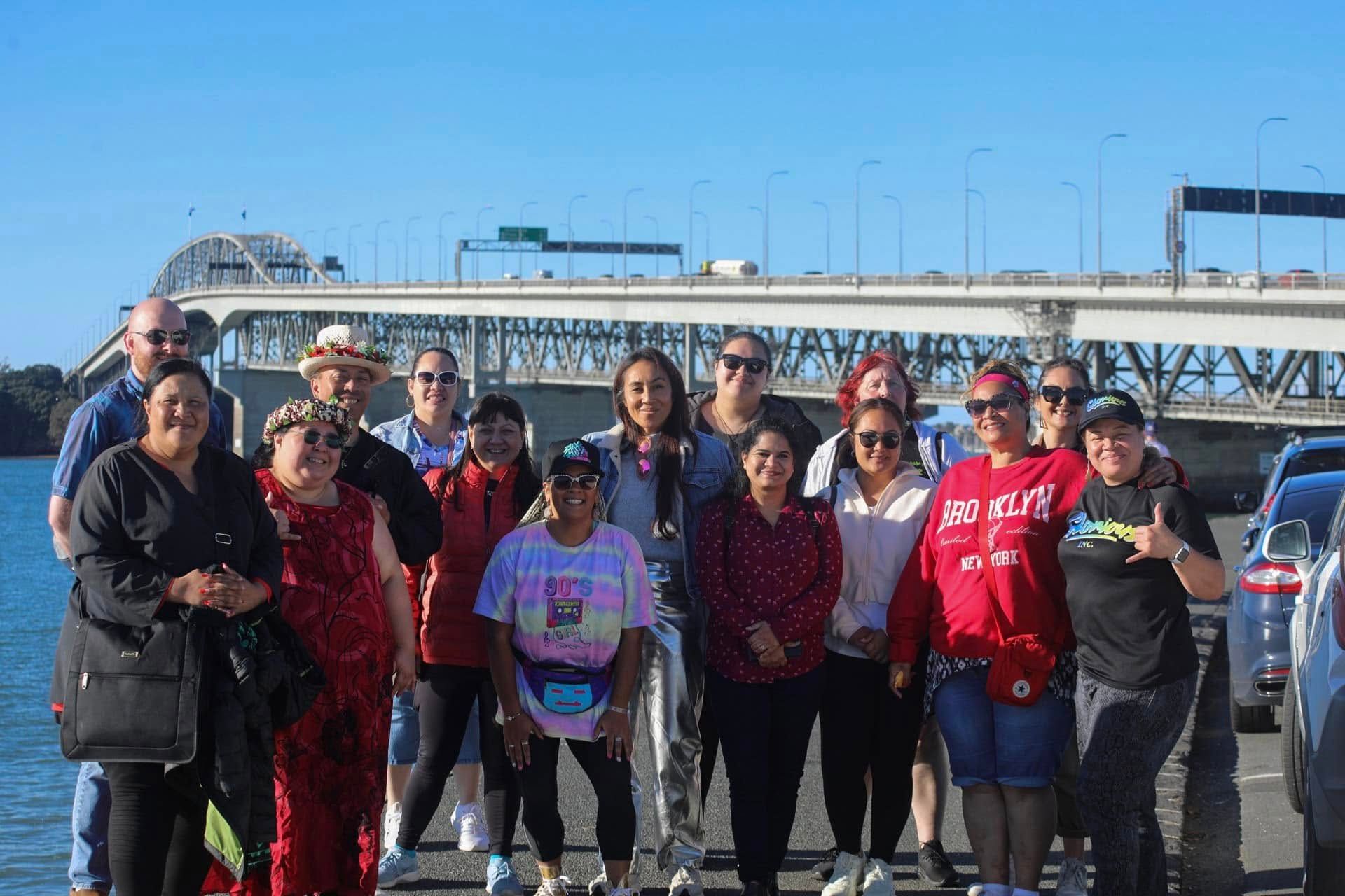 An Auckland Harbour Bridge tour group which included Pacific fashion extraodinaire, Nora Swann (centre). Photo/Glorious NZ