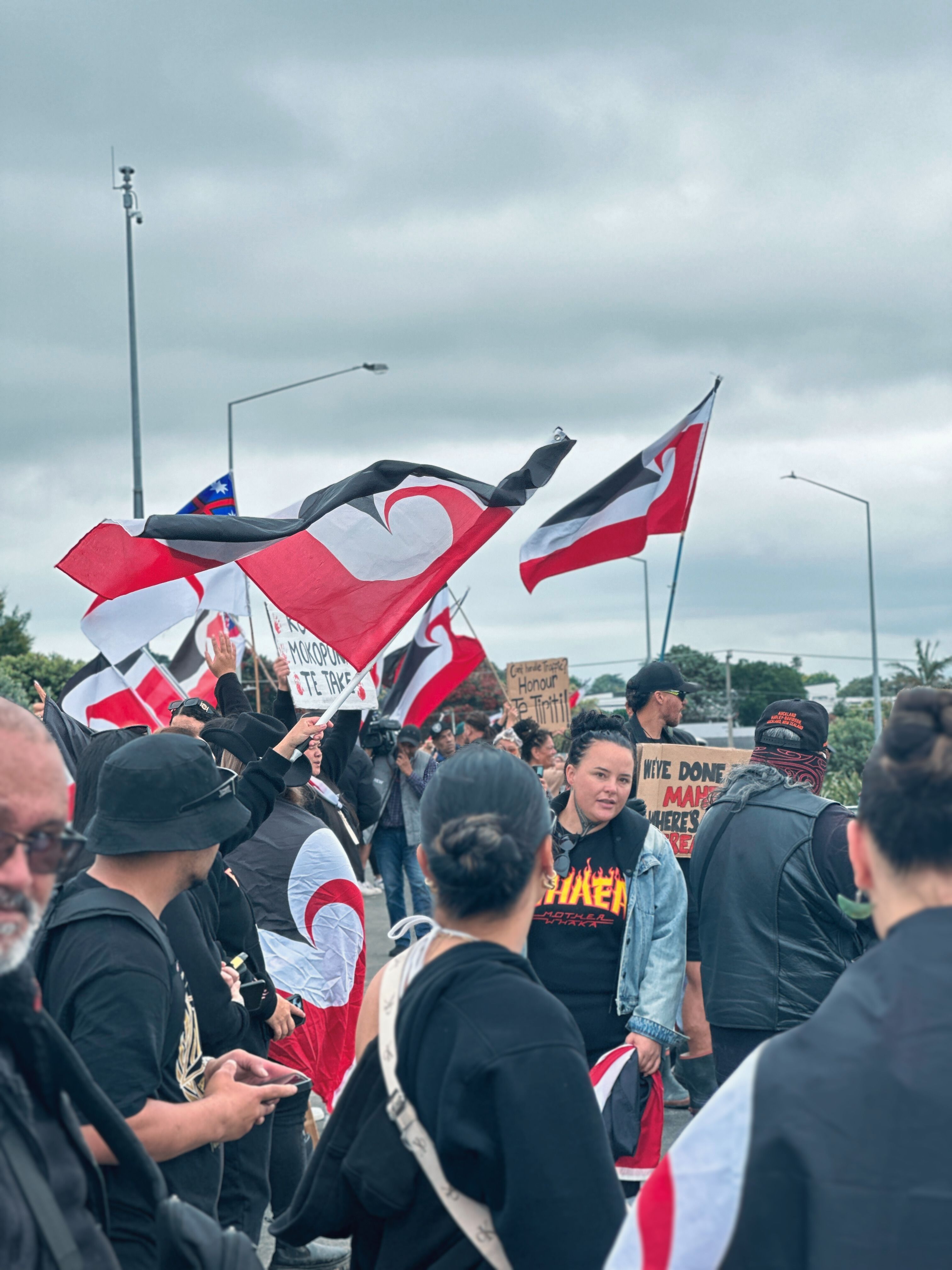 Tino Rangatiratanga flags worn and flown symbolising unity and purpose.Photo/PMN News/Atutahi Potaka-Dewes