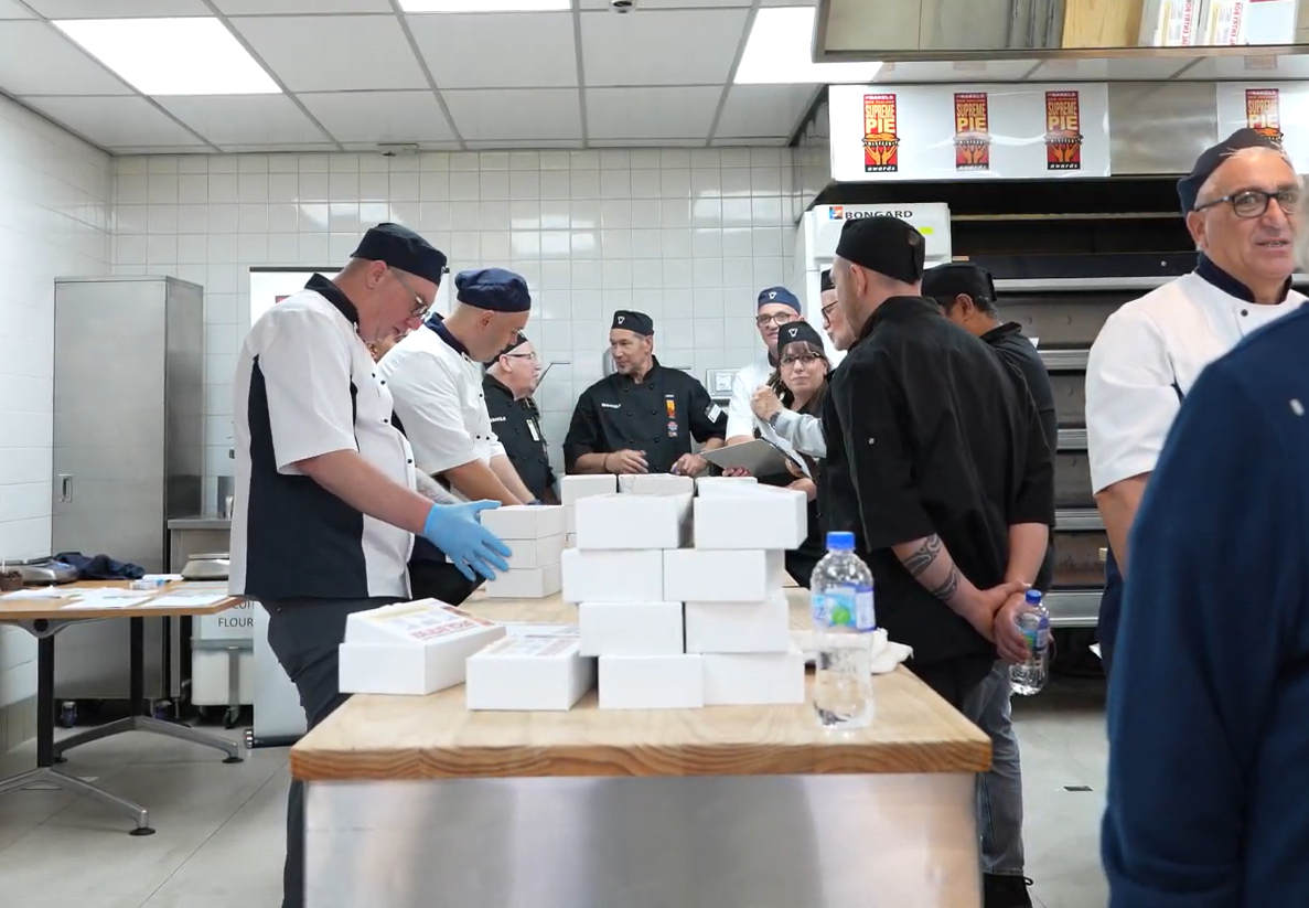 Head judge Ian Moore (centre) joins in on the deliberation phase. Photo/Atutahi Potaka-Dewes