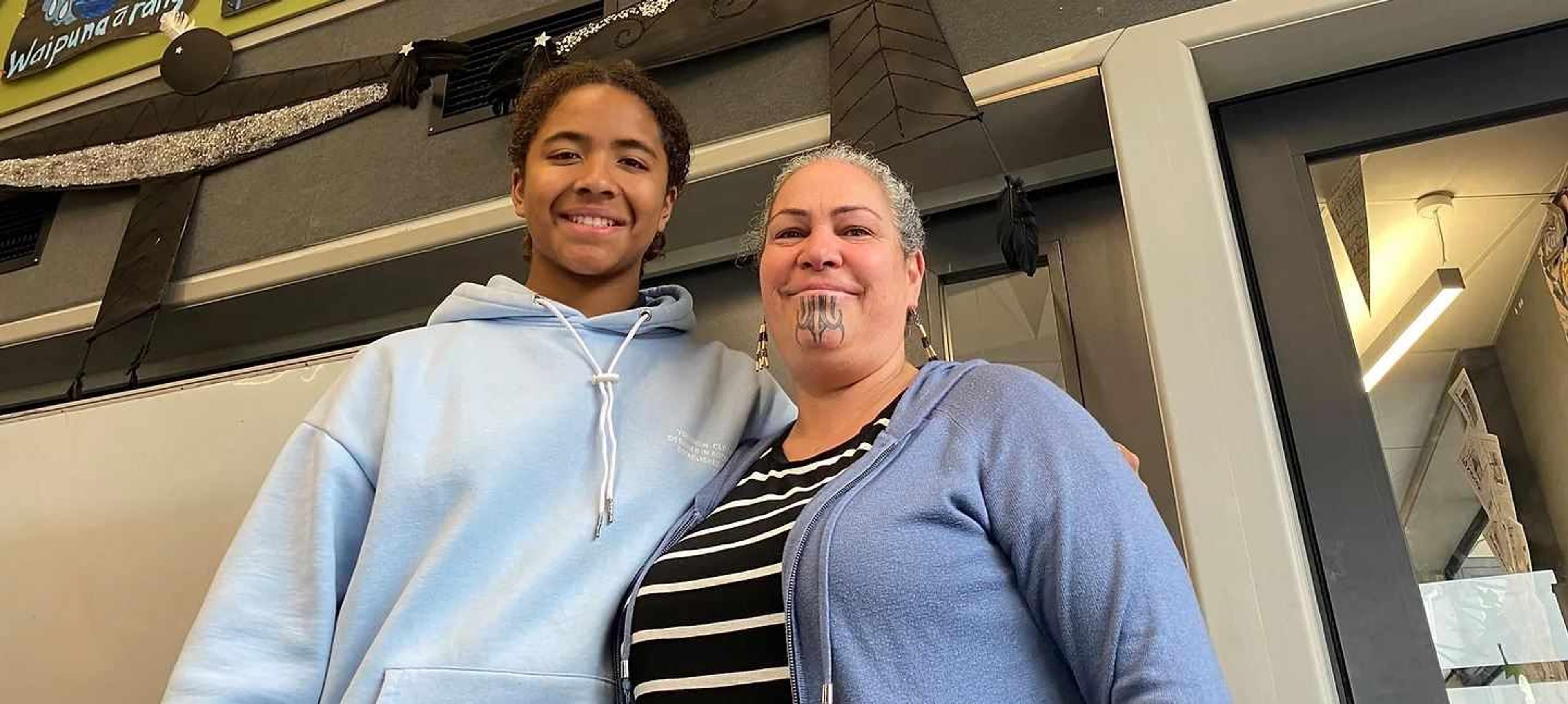 ​Usaia with Erina Henare-Aperahama, who  taught him between the ages of five to 11. Photo/Supplied