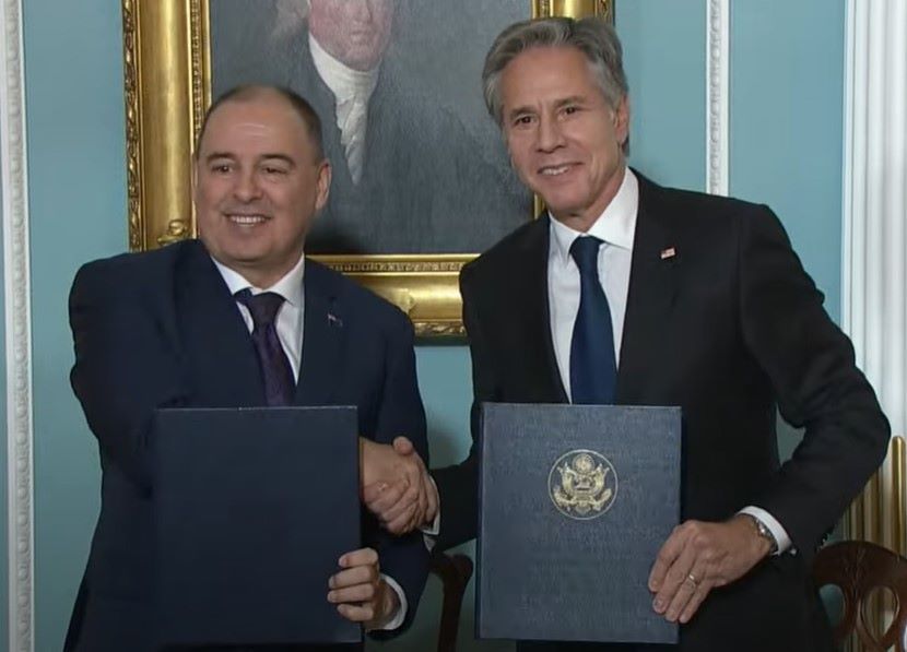 Cook Islands Prime Minister Mark Brown (left) with US Secretary of State Antony Blinken at today's signing. Photo/Screenshot