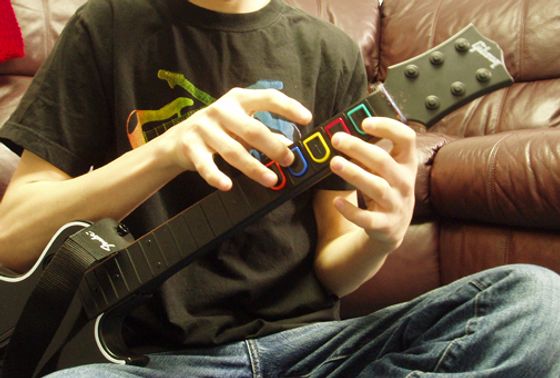 A Guitar Hero guitar controller for the PlayStation 2