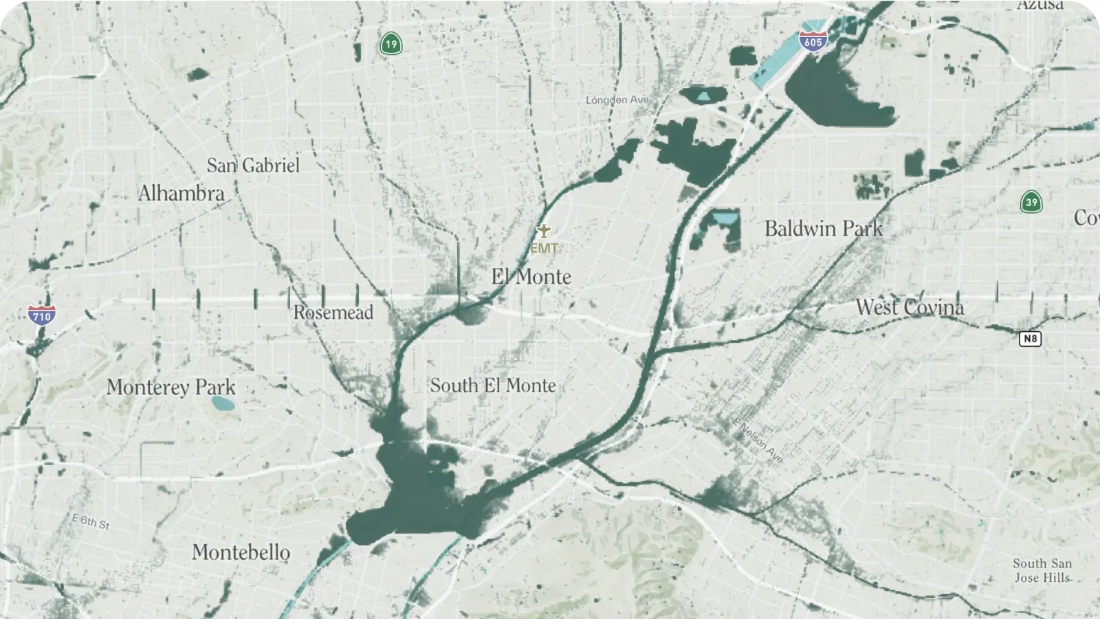 Green clusters show flood risk corridors between Alhambra and West Covina in L.A. County.