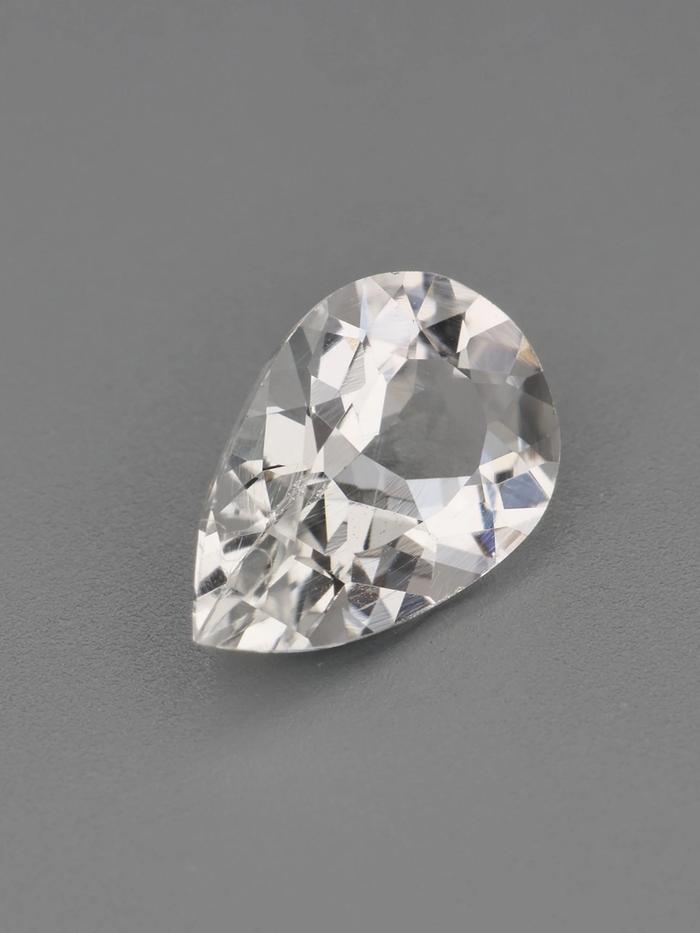 Nangi fine jewelry - white tourmaline gemstone in gold