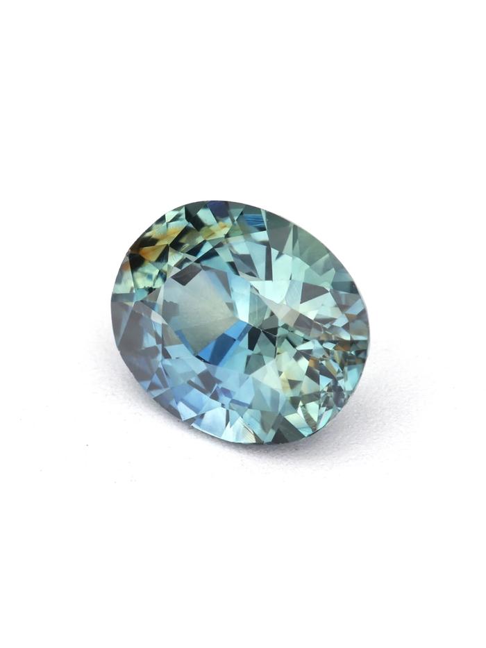 Nangi fine jewelry - teal / Peacock sapphire gemstone in gold