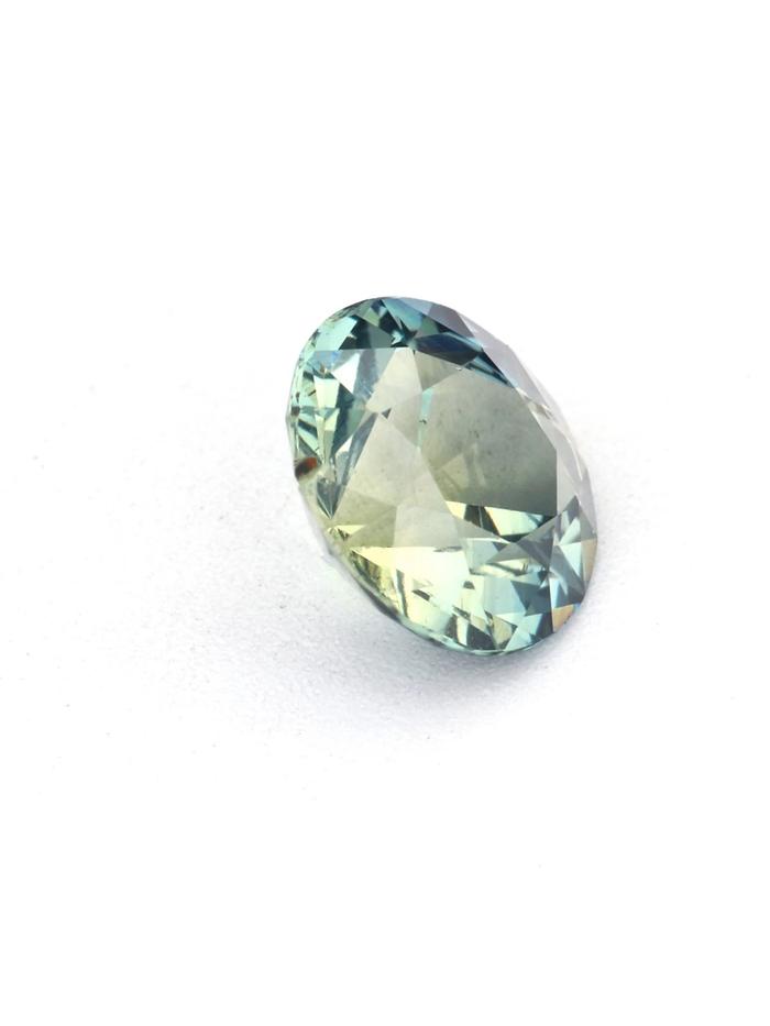 Nangi fine jewelry - teal / Peacock sapphire gemstone in gold