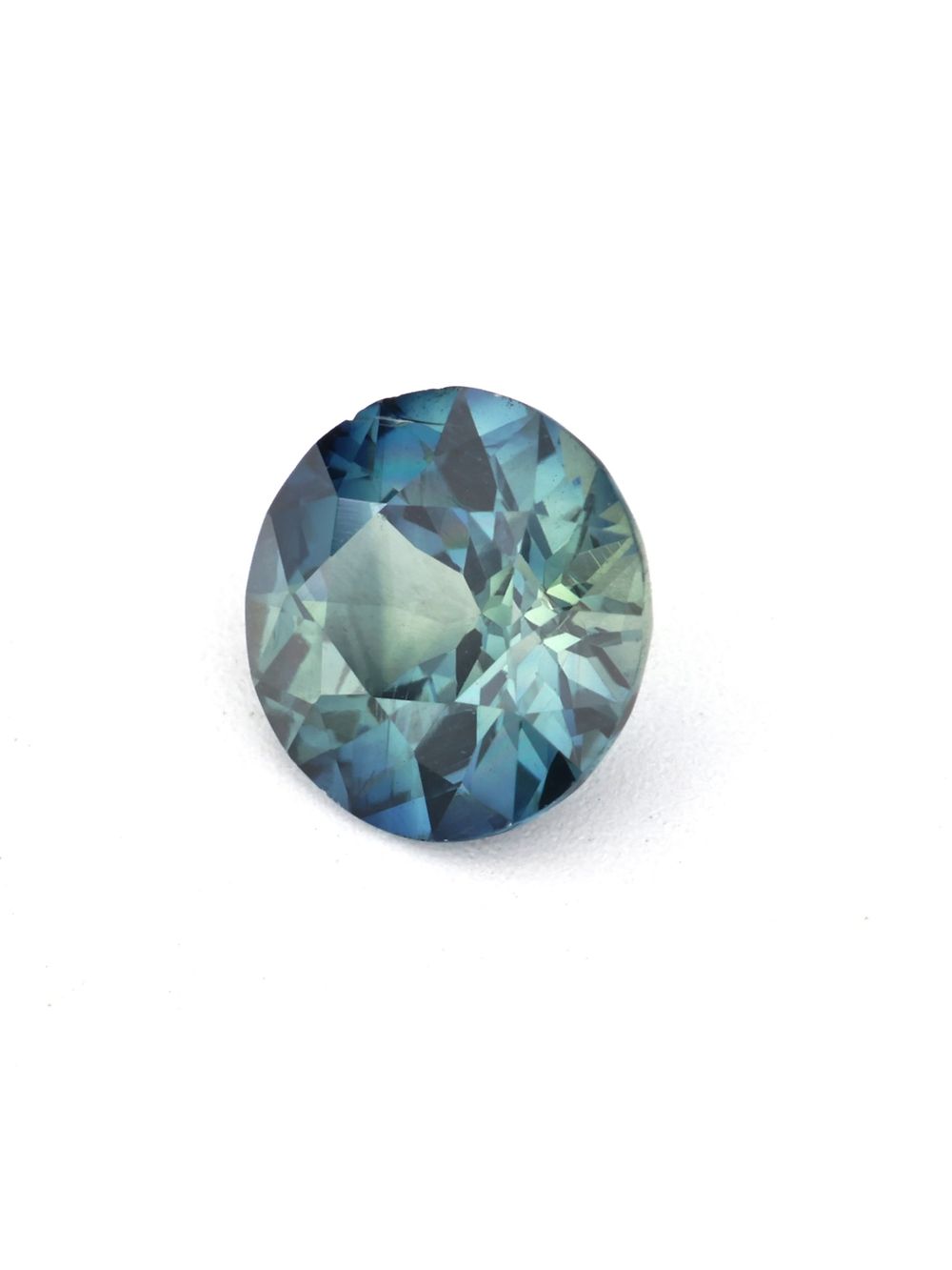 Royal Peacock Sapphire — 0.59 ct Round Cut