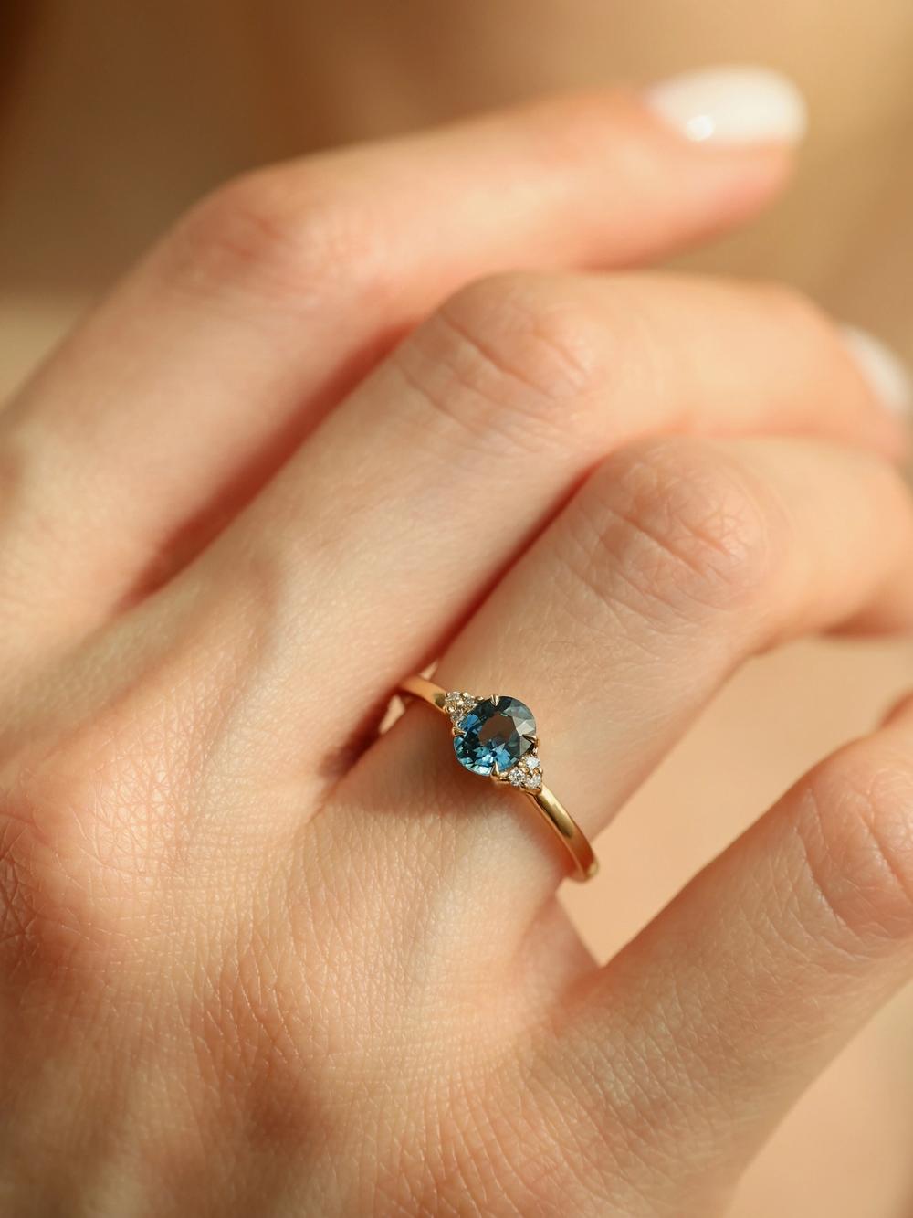 Deep Sea Peacock Oval Sapphire Ring
