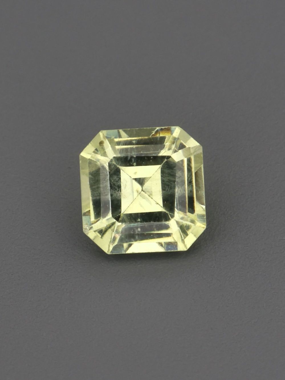 Golden Primrose Sapphire — 0.29 ct Asscher Cut