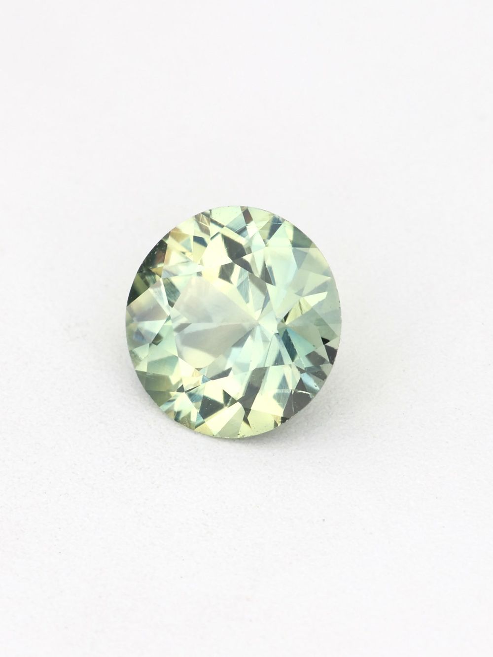Tropical Zest Sapphire — 0.55 ct Round Cut