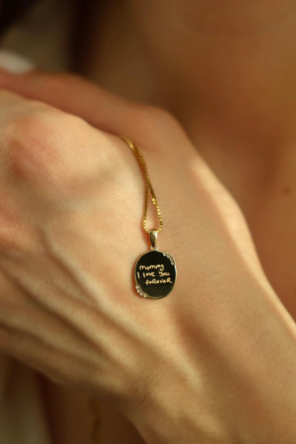 Nangi Push Present Gold pendant with handwritten message