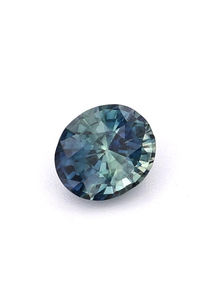 Nangi fine jewelry - teal / Peacock sapphire gemstone in gold