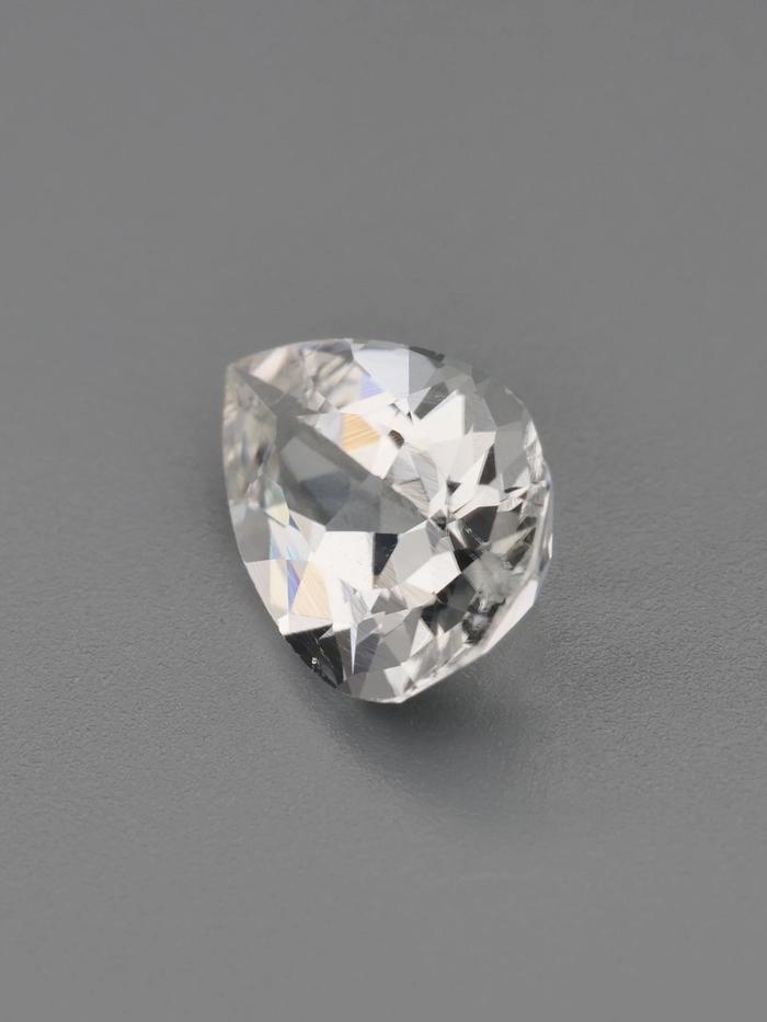 Nangi fine jewelry - white tourmaline gemstone in gold