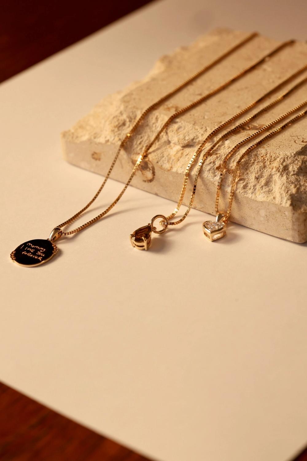 Nangi Push Present Gold pendant with handwritten message