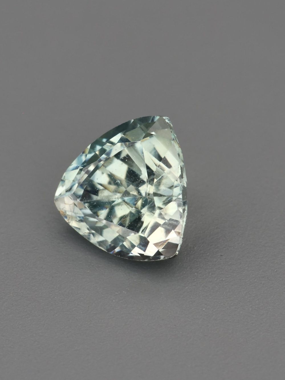 Silver Green Sapphire — 0.60 ct Trillion Cut