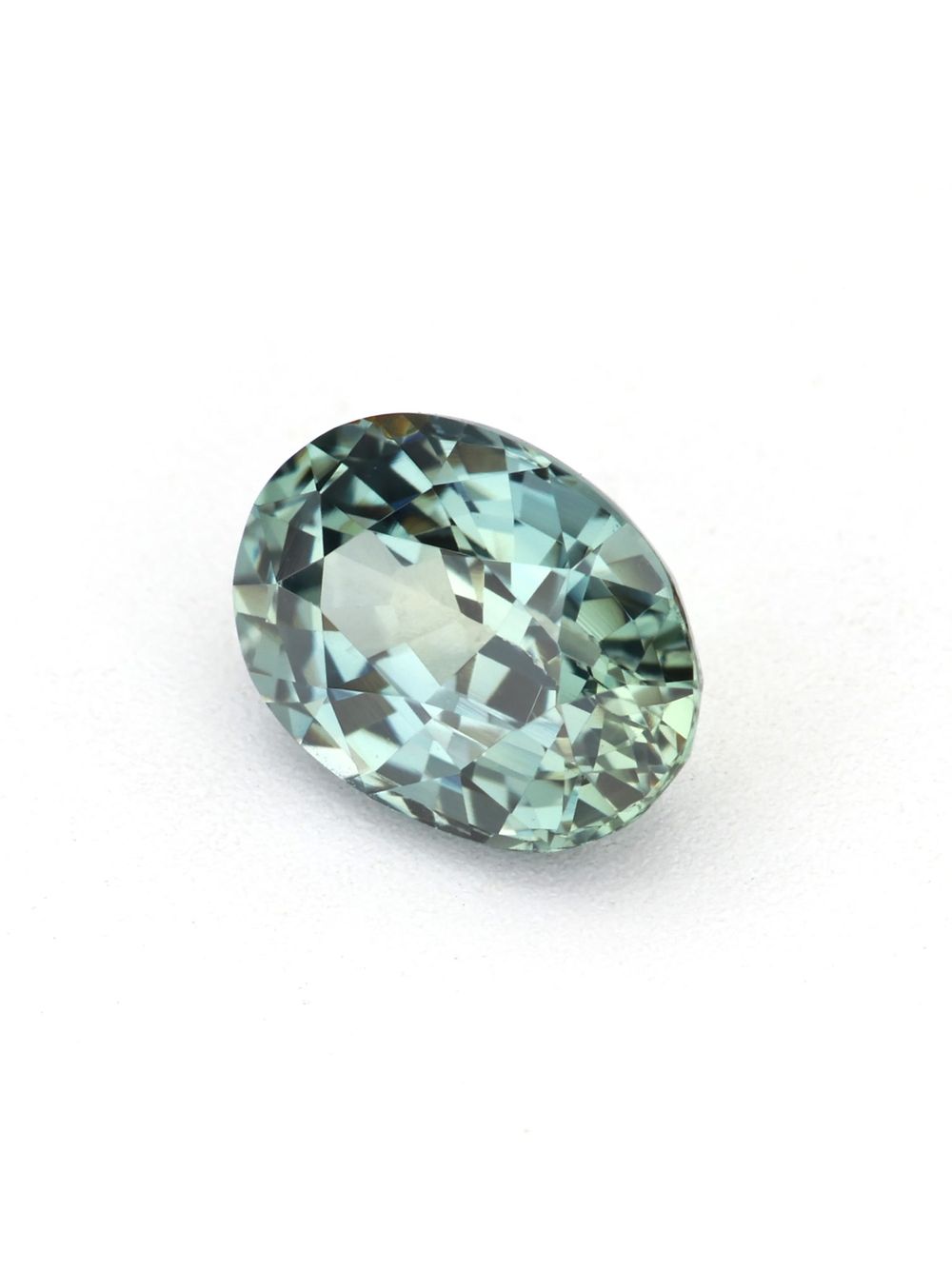 Green Mango Sapphire — 0.77 ct Oval Cut