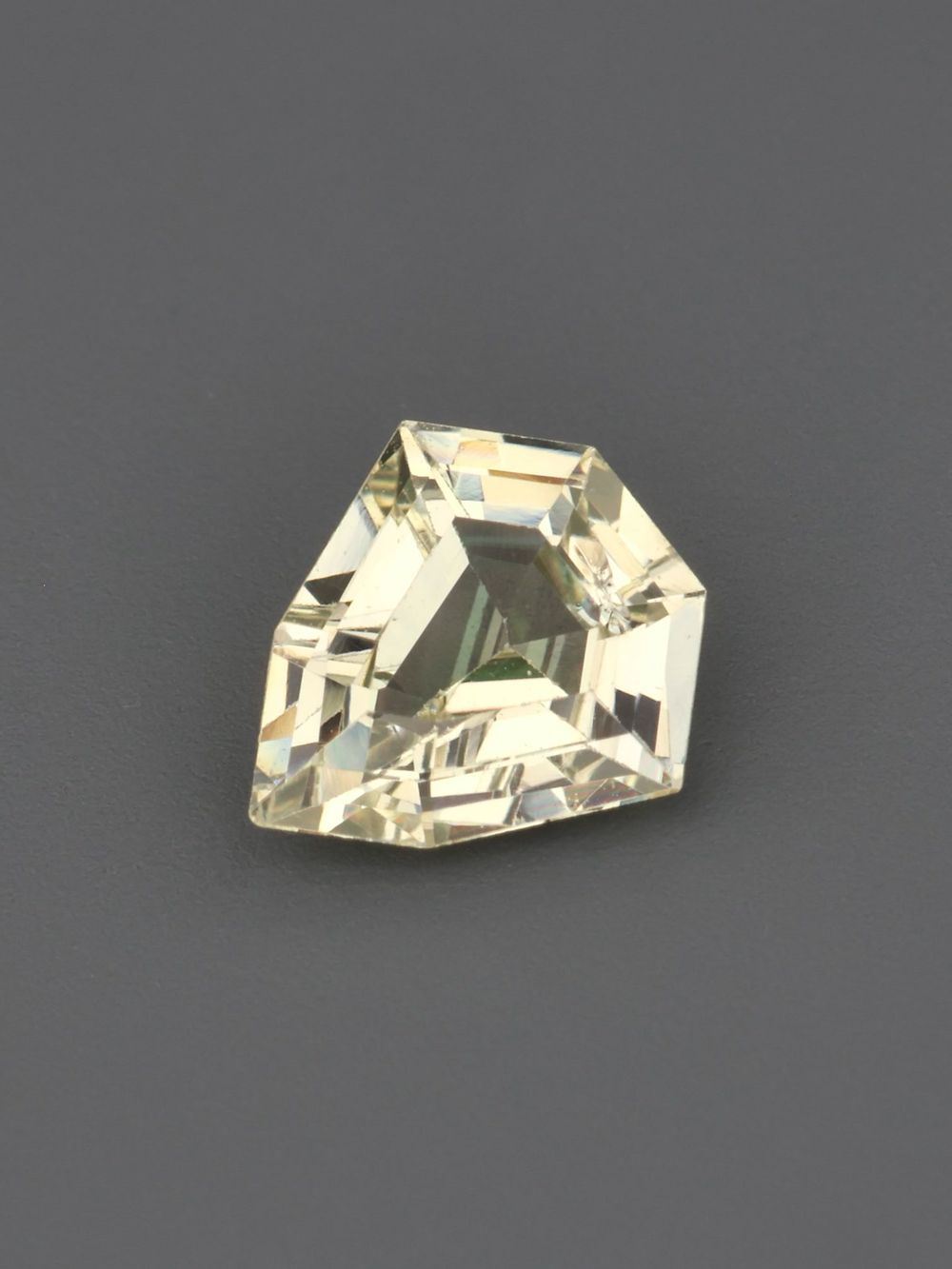 Champagne Crest Sapphire — 0.57 ct Pentagon Cut