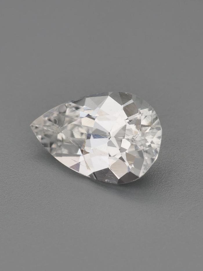 Nangi fine jewelry - white tourmaline gemstone in gold
