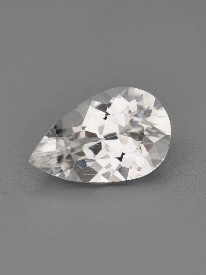 Nangi fine jewelry - white tourmaline gemstone in gold
