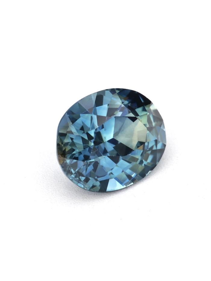 Nangi fine jewelry - teal / Peacock sapphire gemstone in gold