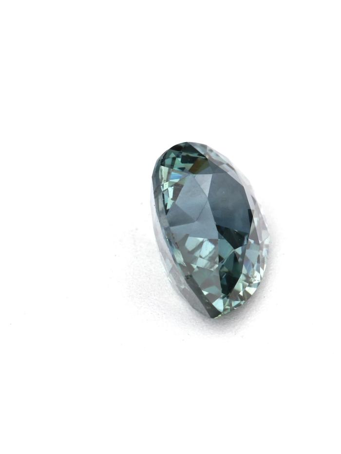 Nangi fine jewelry - teal / Peacock sapphire gemstone in gold