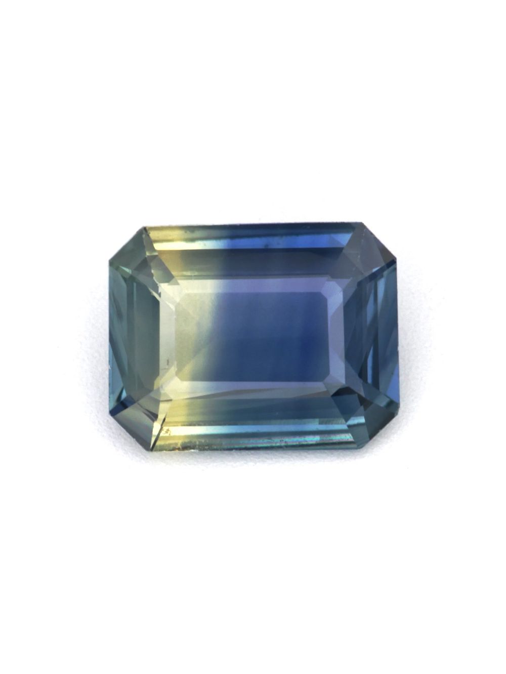 Golden Monsoon Sapphire — 0.96 ct Emerald Cut