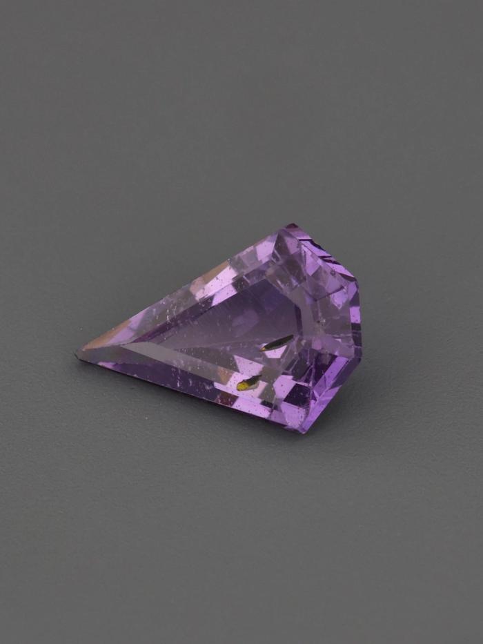 Nangi fine jewelry - purple gemstone in gold
