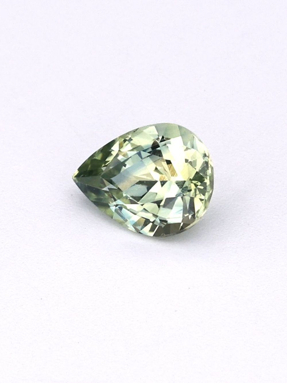 0.65 ct Light Green, Pear Cut Sapphire