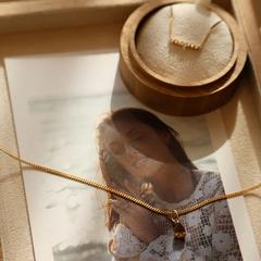Nangi fine jewelry - brown tourmaline pendant in yellow gold