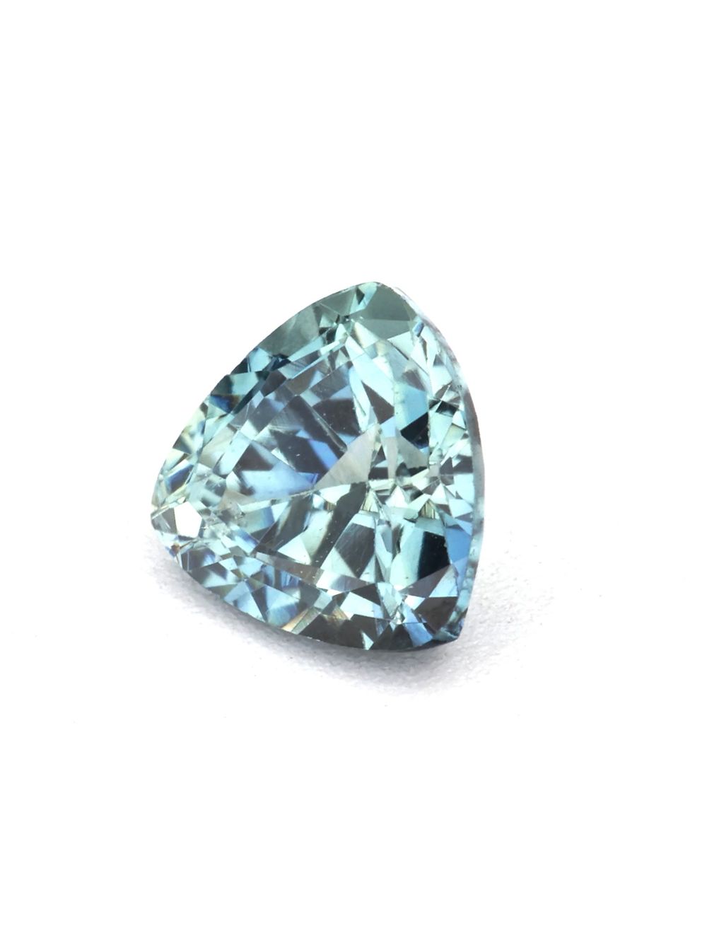 Coral Water Sapphire — 0.45 ct Trillion Cut