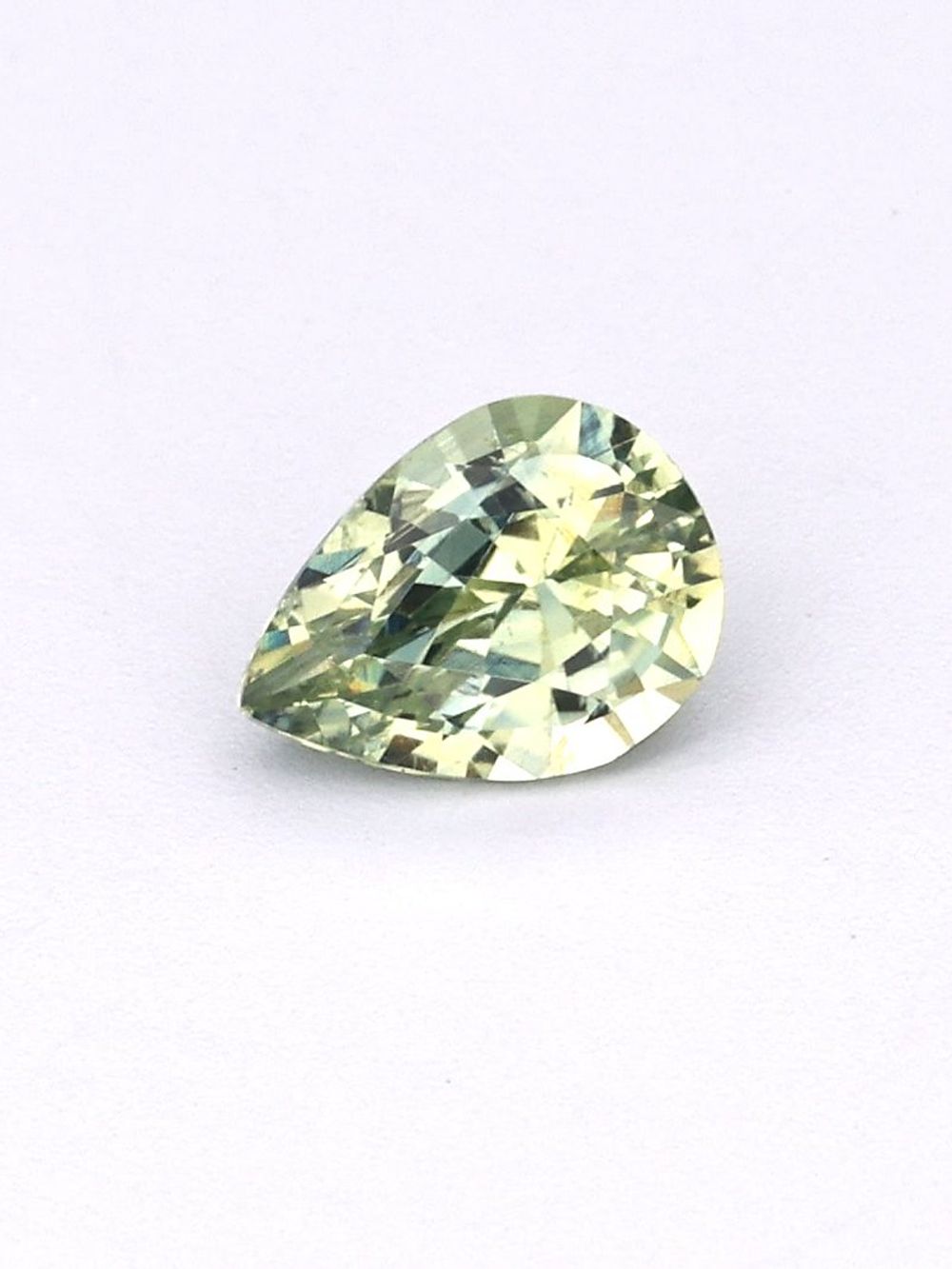 0.65 ct Light Green, Pear Cut Sapphire