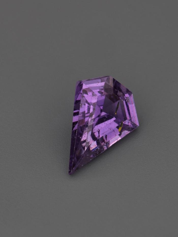 Nangi fine jewelry - purple gemstone in gold