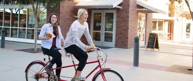 Students Riding Tandem Bike