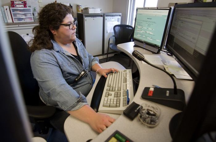 Woman Sitting at Computer