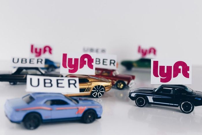 Toy Cars with Uber and Lyft Signs