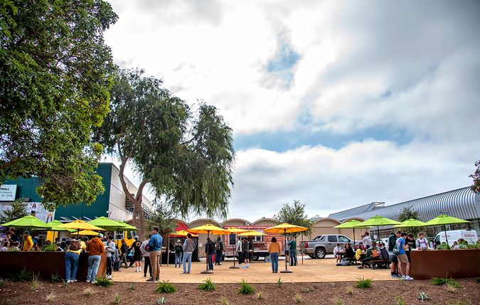 wide  food truck village in front of Mott Gym.