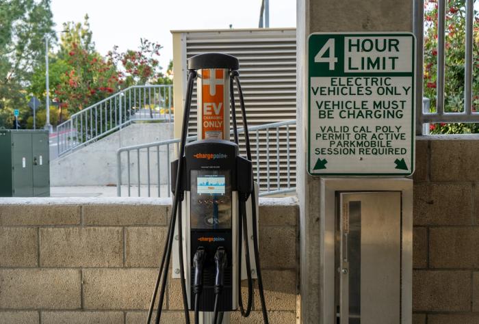 An electric vehicle charger inside the Grand Ave. parking garage.