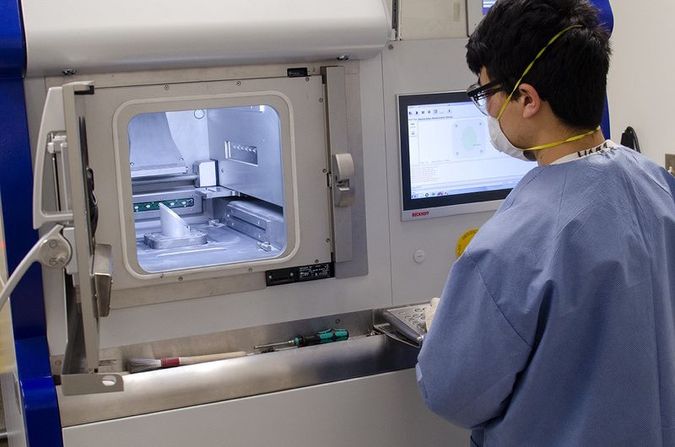 Student with Advanced Technology Machine