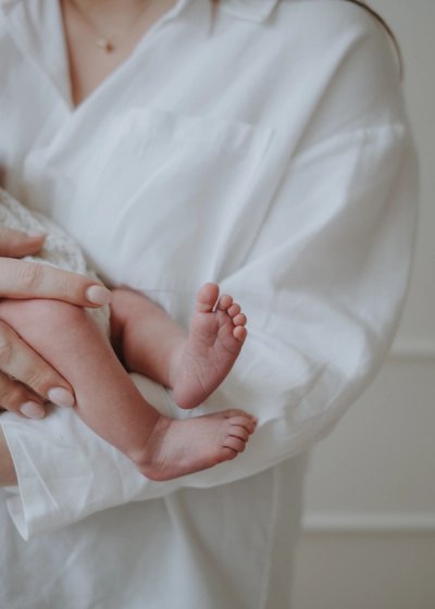 Parents sharing a quiet moment with their newborn baby at home