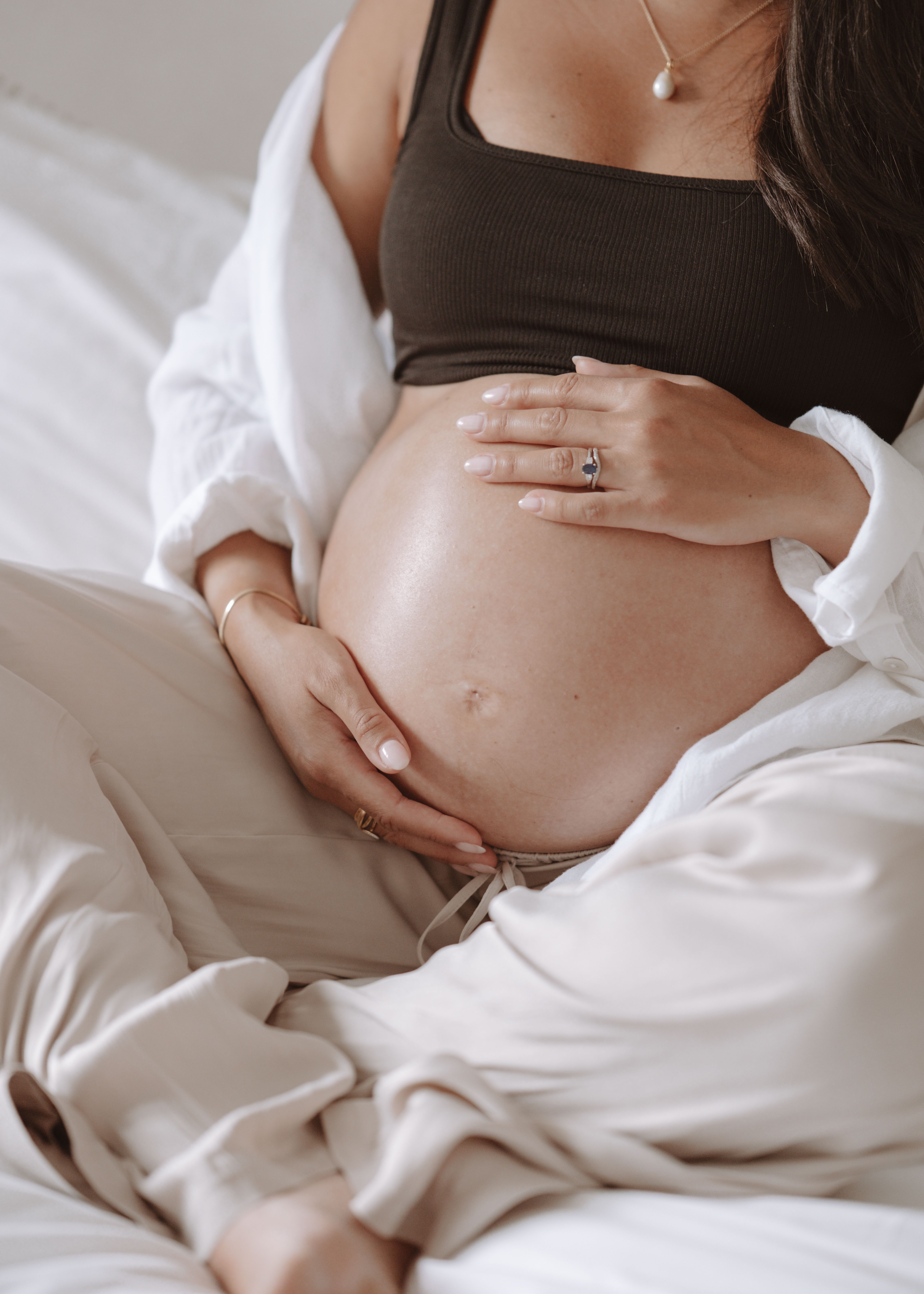 Detail of pregnancy bump by Rhiannon Emma