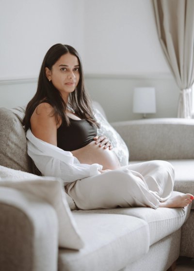 Pregnant female on sofa