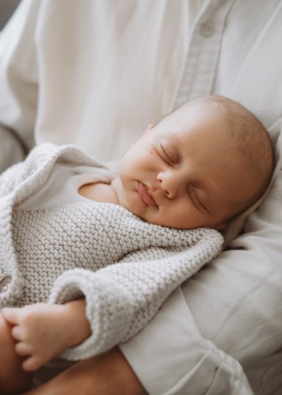 Family portrait with a newborn baby during a natural London photography session