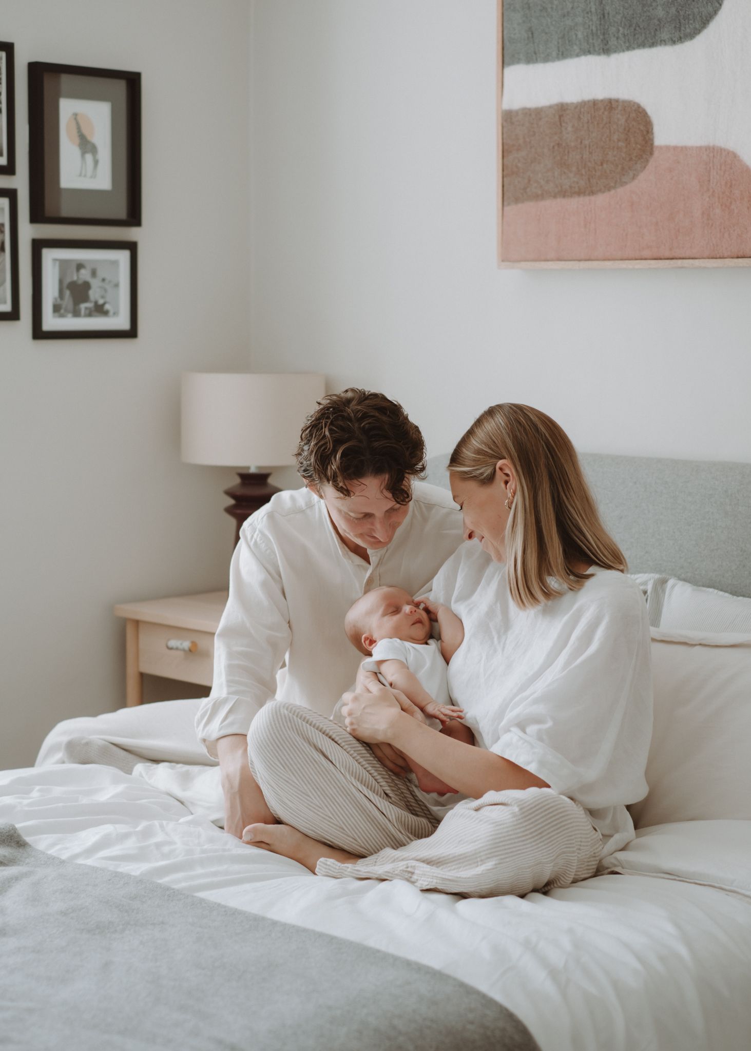 Newborn baby awake and looking towards the camera at home