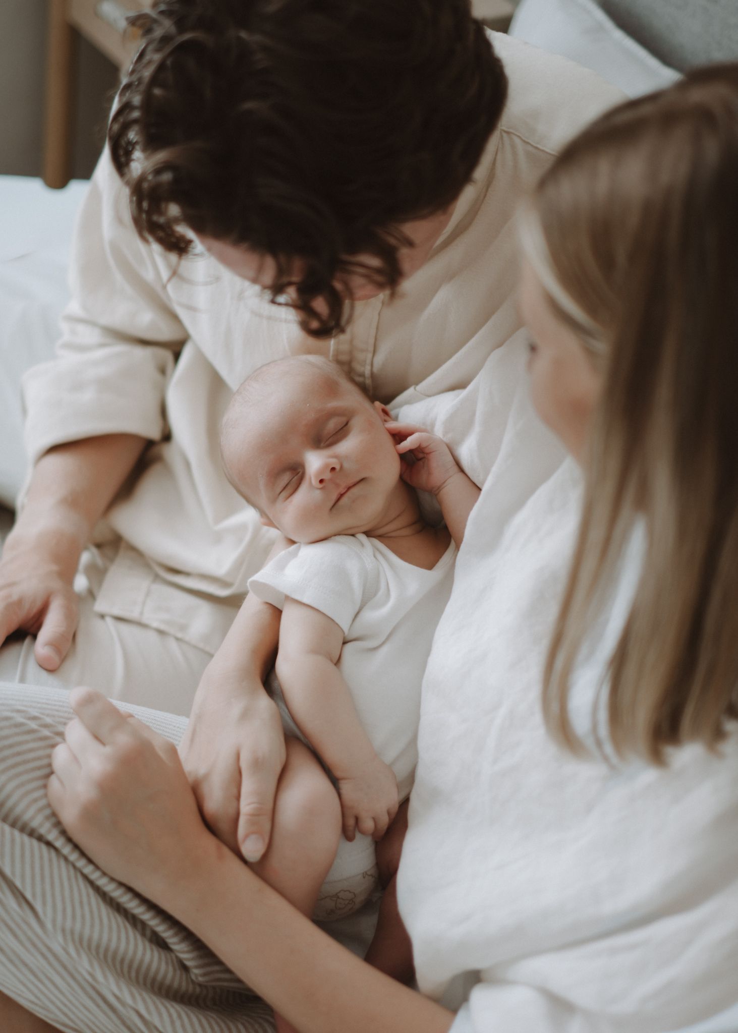 Newborn baby resting peacefully during a natural at-home photography session in London